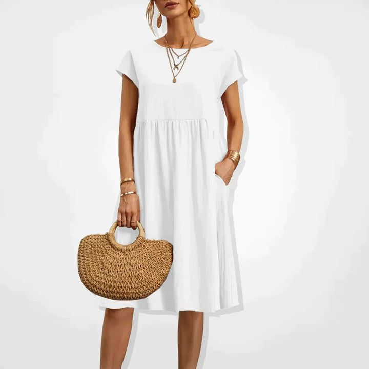 "Elegantes Damen-Sommerkleid mit Empire-Silhouette, kurze Ärmel, luftiger Rock, ideal für warme Tage, vielseitiger Stil."