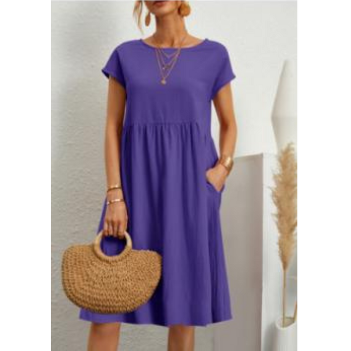 "Elegantes Damen-Sommerkleid mit Empire-Silhouette, kurze Ärmel, luftiger Rock, ideal für warme Tage, vielseitiger Stil."