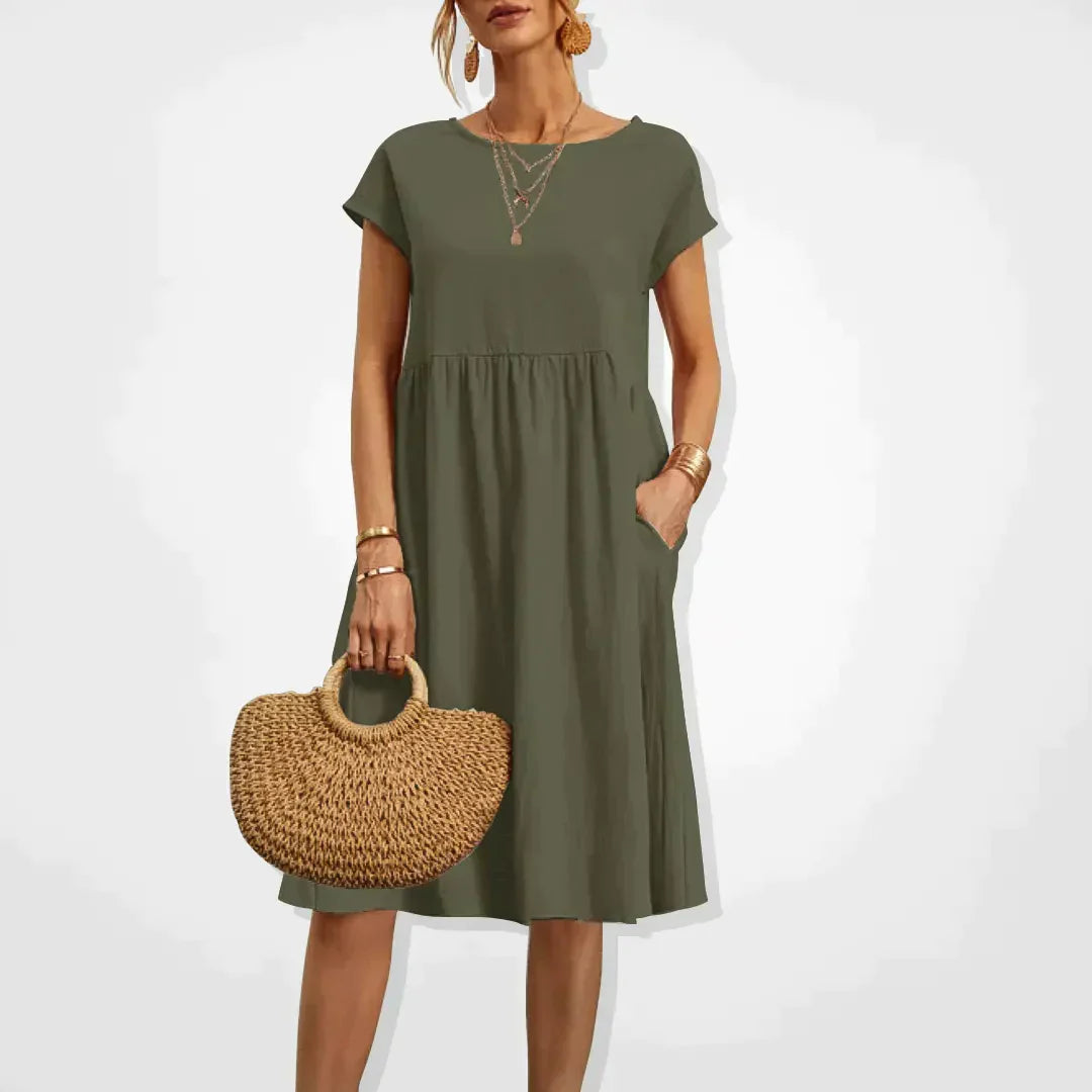 "Elegantes Damen-Sommerkleid mit Empire-Silhouette, kurze Ärmel, luftiger Rock, ideal für warme Tage, vielseitiger Stil."