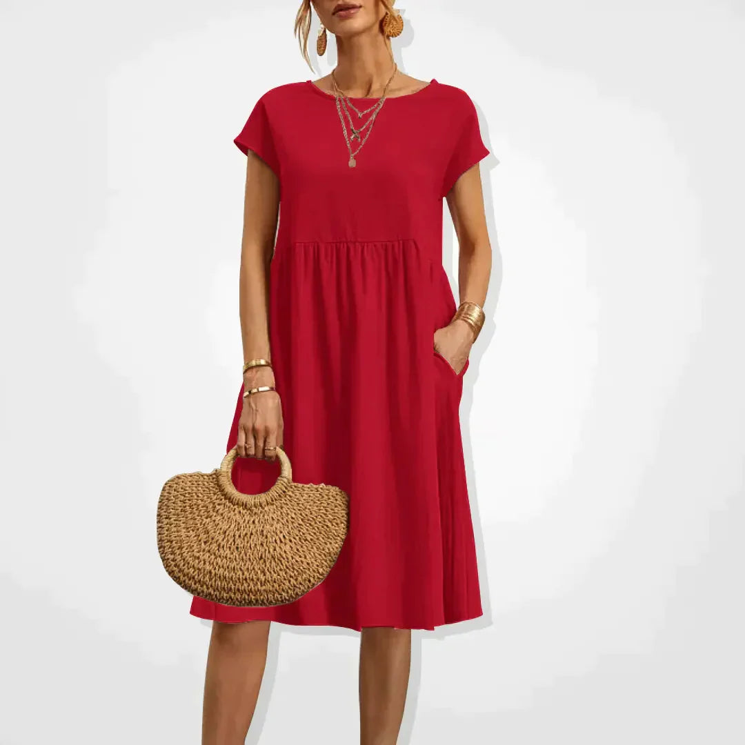 "Elegantes Damen-Sommerkleid mit Empire-Silhouette, kurze Ärmel, luftiger Rock, ideal für warme Tage, vielseitiger Stil."