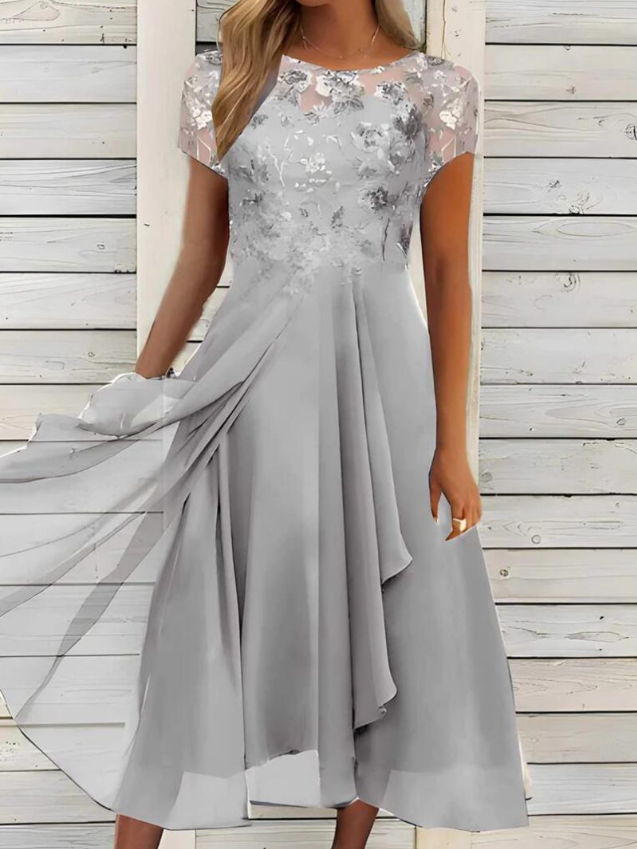 Elegantes Damen-Sommerkleid ohne Ärmel, luftig und stilvoll, ideal für Gartenpartys, aus hochwertigem Stoff.