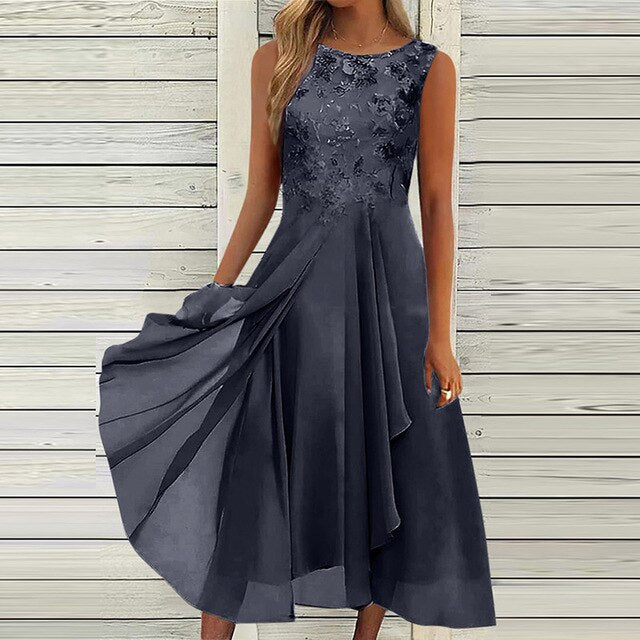 Elegantes Damen-Sommerkleid ohne Ärmel, luftig und stilvoll, ideal für Gartenpartys, aus hochwertigem Stoff.