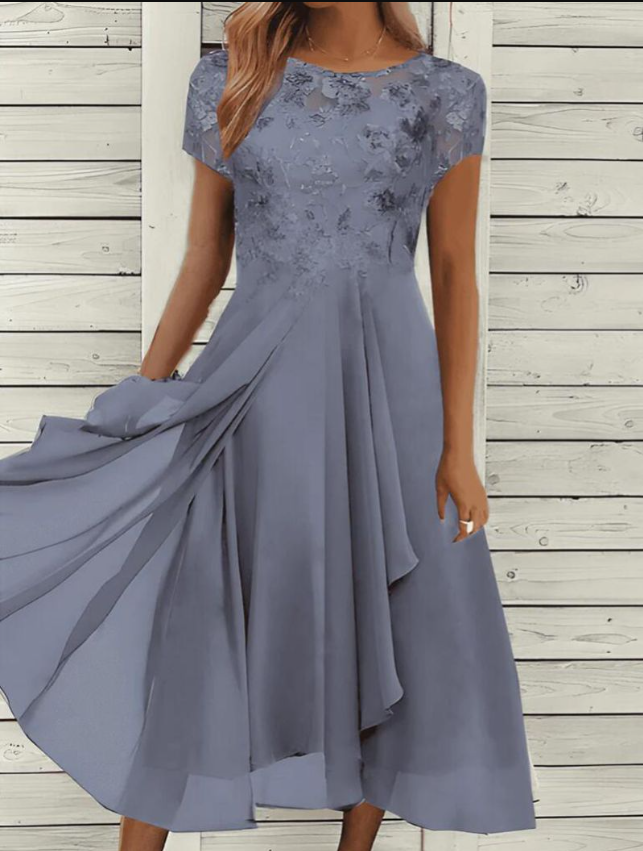 Elegantes Damen-Sommerkleid ohne Ärmel, luftig und stilvoll, ideal für Gartenpartys, aus hochwertigem Stoff.