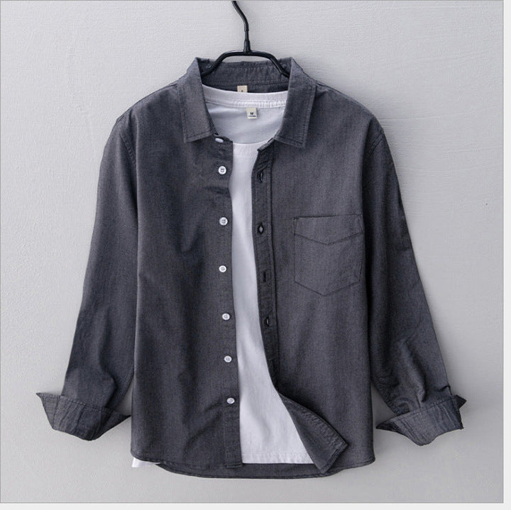 "Elegantes Herren-Oxford-Hemd aus Baumwolle, atmungsaktiv, in klassischem Design, ideal für formelle Anlässe."