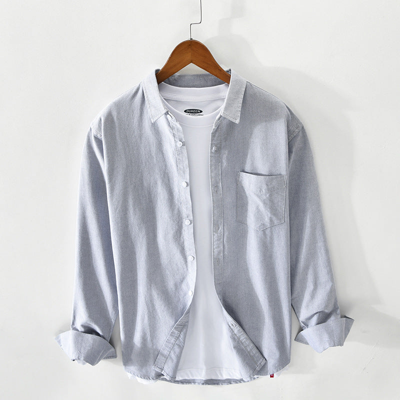 "Elegantes Herren-Oxford-Hemd aus Baumwolle, atmungsaktiv, in klassischem Design, ideal für formelle Anlässe."