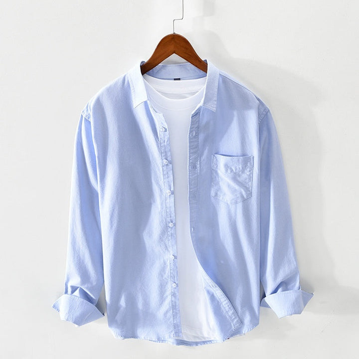 "Elegantes Herren-Oxford-Hemd aus Baumwolle, atmungsaktiv, in klassischem Design, ideal für formelle Anlässe."