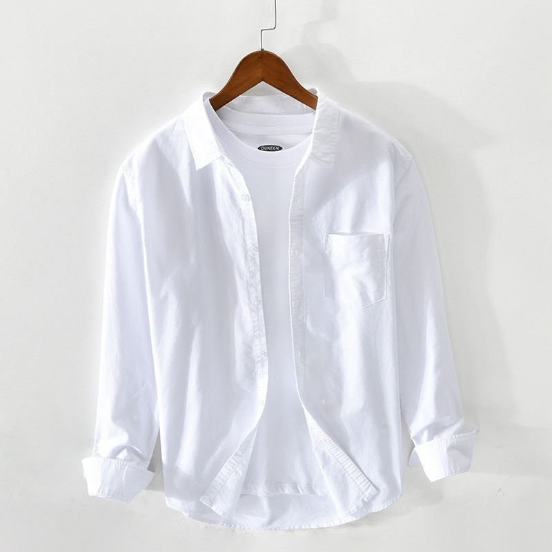 "Elegantes Herren-Oxford-Hemd aus Baumwolle, atmungsaktiv, in klassischem Design, ideal für formelle Anlässe."