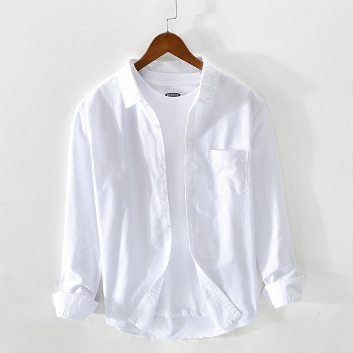 "Elegantes Herren-Oxford-Hemd aus Baumwolle, atmungsaktiv, in klassischem Design, ideal für formelle Anlässe."