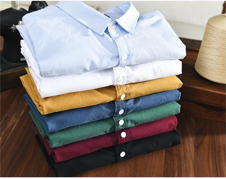 "Elegantes Herren-Oxford-Hemd aus Baumwolle, atmungsaktiv, in klassischem Design, ideal für formelle Anlässe."