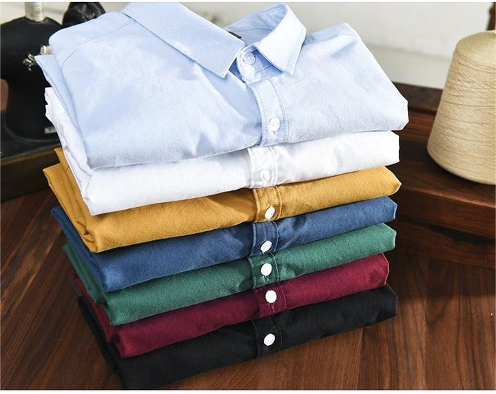 "Elegantes Herren-Oxford-Hemd aus Baumwolle, atmungsaktiv, in klassischem Design, ideal für formelle Anlässe."