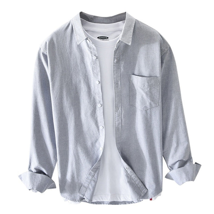 "Elegantes Herren-Oxford-Hemd aus Baumwolle, atmungsaktiv, in klassischem Design, ideal für formelle Anlässe."