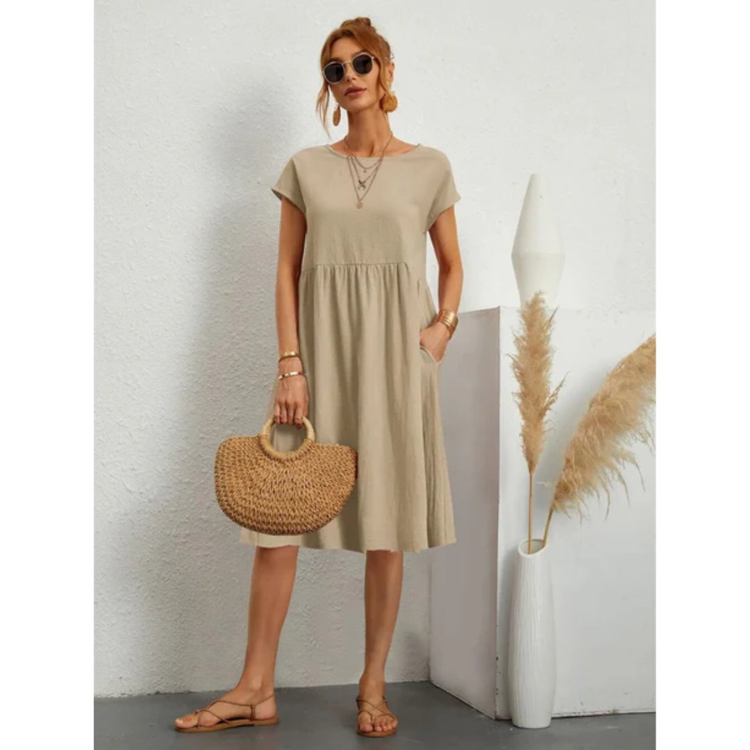 "Elegantes kurzärmeliges Sommerkleid in Midi-Länge für Damen, betont die Silhouette, ideal für formelle Anlässe und Freizeit.