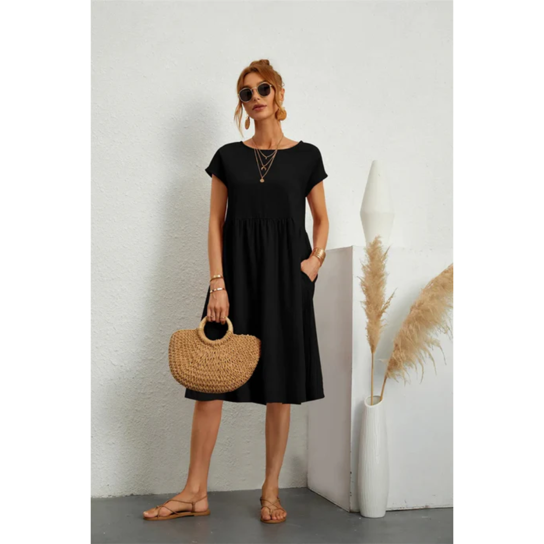 "Elegantes kurzärmeliges Sommerkleid in Midi-Länge für Damen, betont die Silhouette, ideal für formelle Anlässe und Freizeit.