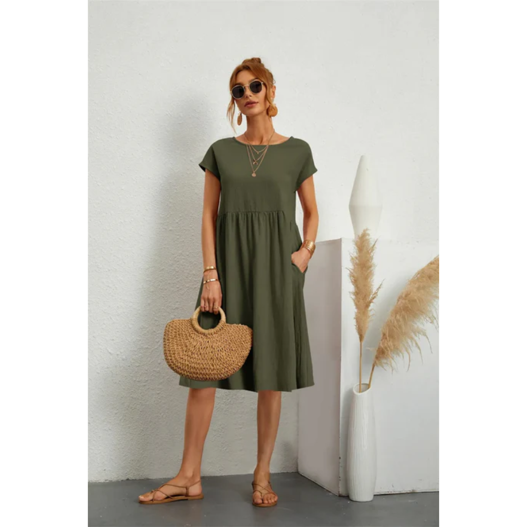 "Elegantes kurzärmeliges Sommerkleid in Midi-Länge für Damen, betont die Silhouette, ideal für formelle Anlässe und Freizeit.