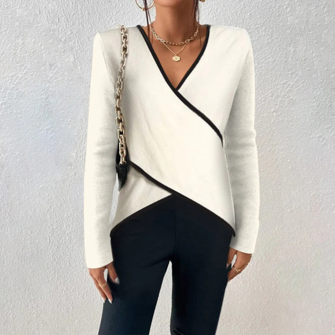 "Elegantes langärmliges Damen V-Ausschnitt-Top in Beige, vielseitig für Alltag oder Anlass, betont Figur mit schickem Design.