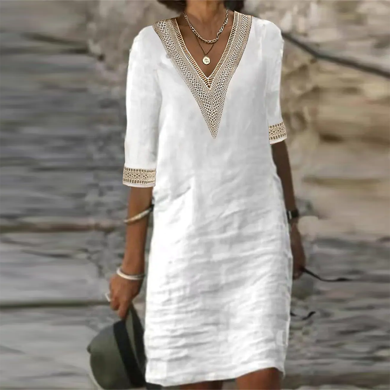 Elegantes Leinen Sommerkleid Damen in Weiß, knielang, mit kurzer Ärmeloptik und leichtem Stoff für elegante Anlässe.