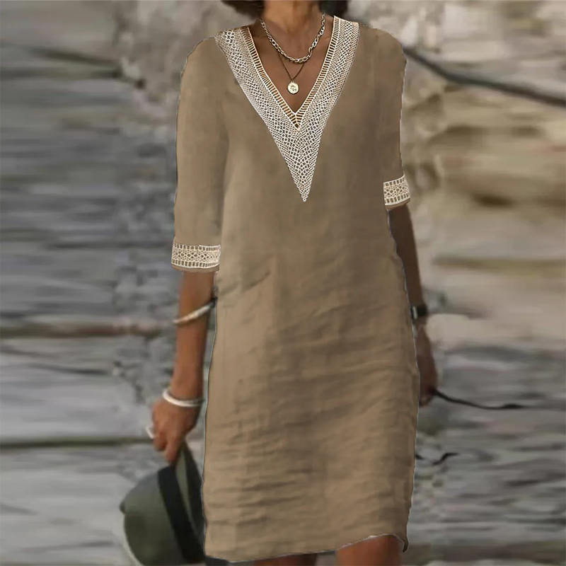 Elegantes Leinen Sommerkleid Damen in Weiß, knielang, mit kurzer Ärmeloptik und leichtem Stoff für elegante Anlässe.
