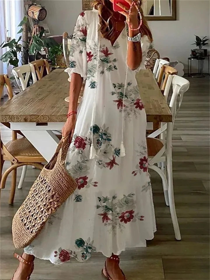"Elegantes Maxi Sommerkleid Damen, fließende Silhouette, zarte Farben, ideal für Strandtage und Abendveranstaltungen."
