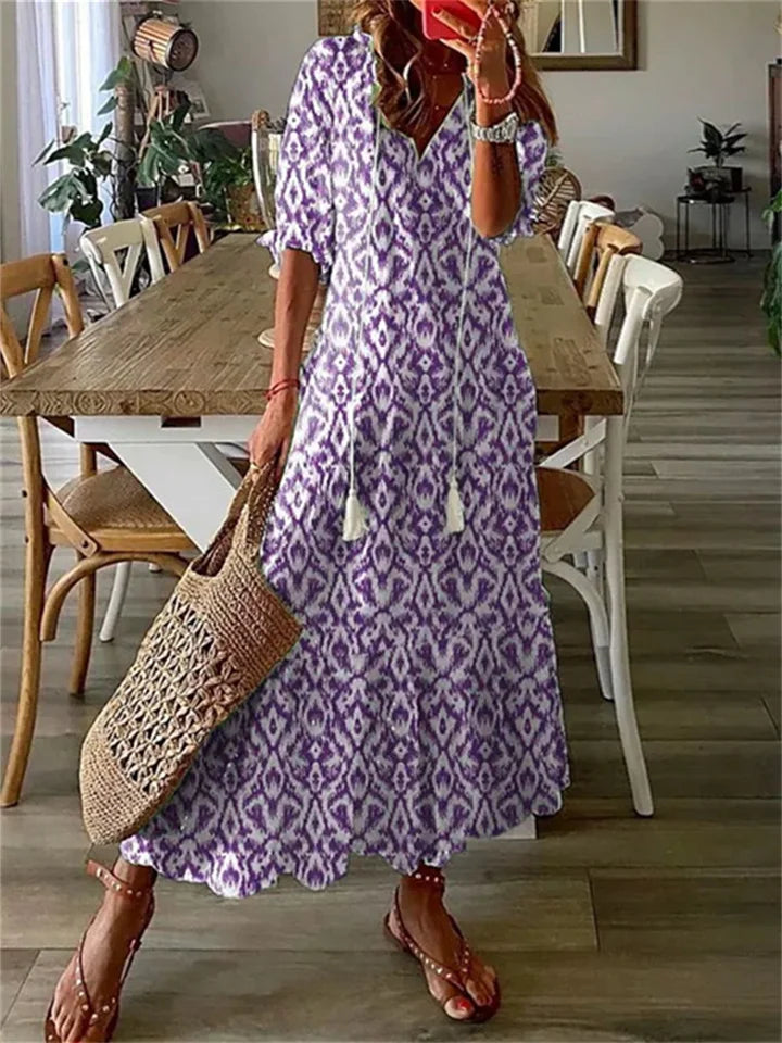 "Elegantes Maxi Sommerkleid Damen, fließende Silhouette, zarte Farben, ideal für Strandtage und Abendveranstaltungen."