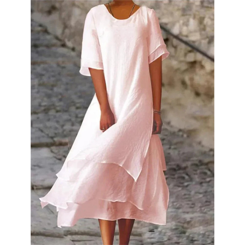Elegantes Midi Damenkleid mit fließendem Stoff in sanften Farben, umschmeichelt die Figur und bietet hohen Tragekomfort.