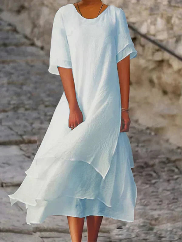 Elegantes schwarzes Blockschlitzkleid mit figurbetontem Schnitt, ideal für elegante Anlässe und glamouröse Abende.