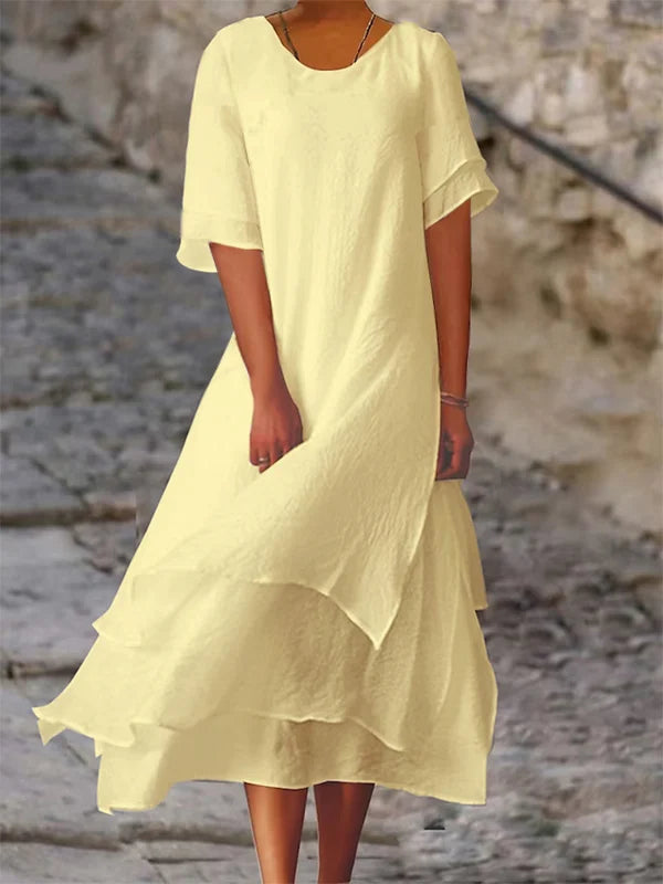 Elegantes schwarzes Blockschlitzkleid mit figurbetontem Schnitt, ideal für elegante Anlässe und glamouröse Abende.