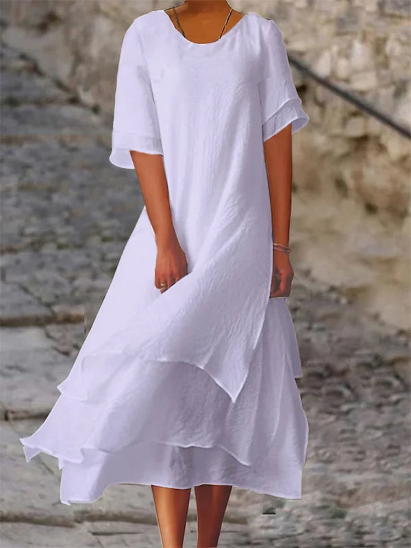Elegantes schwarzes Blockschlitzkleid mit figurbetontem Schnitt, ideal für elegante Anlässe und glamouröse Abende.
