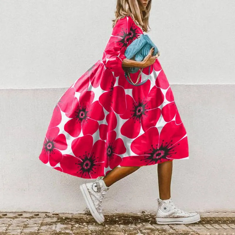 "Elegantes Sommerkleid mit Blumenmuster, luftiger Stoff, bequeme Passform, ideal für stilvolle, unbeschwerte Sommertage."