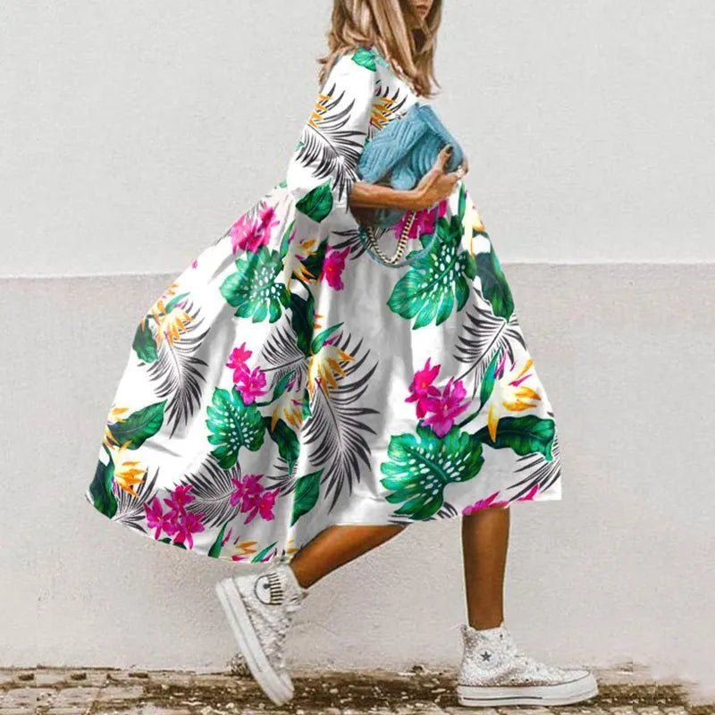 "Elegantes Sommerkleid mit Blumenmuster, luftiger Stoff, bequeme Passform, ideal für stilvolle, unbeschwerte Sommertage."