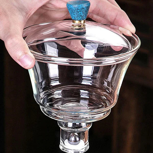 "Elegantes Teeset mit magnetischem System, Glasteekanne, Filter, Tassen; stilvolles Design, ideal für Teeliebhaber."