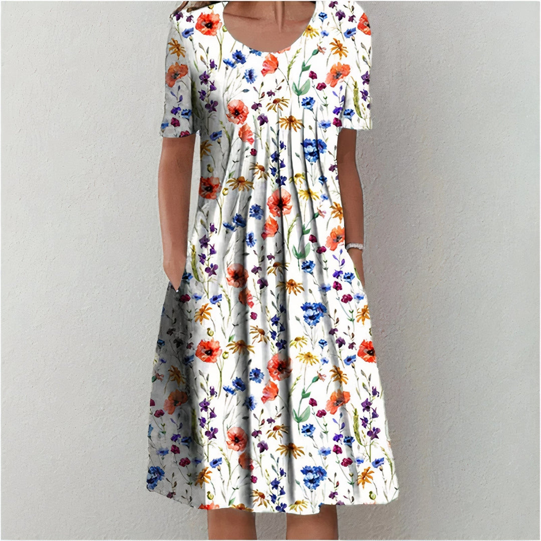 "Elegantes weißes Baumwoll-Sommerkleid für Damen, knielang und fließend, ideal für elegante, sommerliche Anlässe."