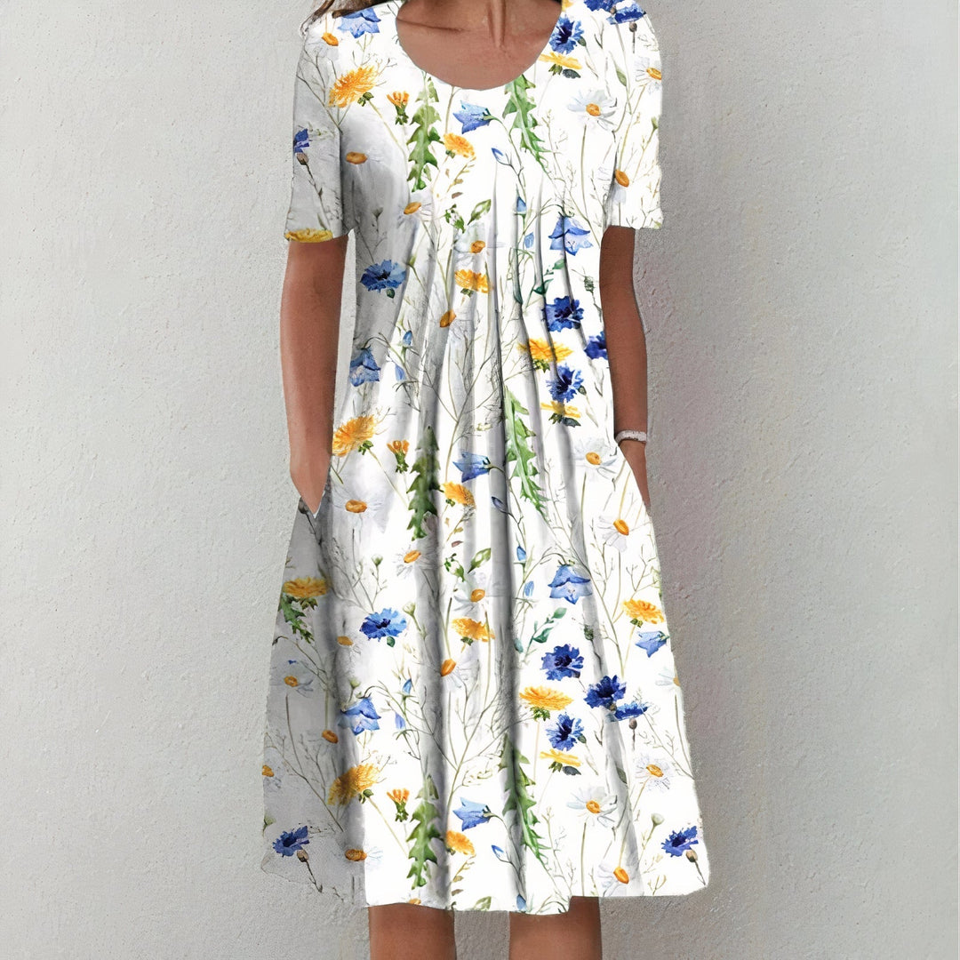 "Elegantes weißes Baumwoll-Sommerkleid für Damen, knielang und fließend, ideal für elegante, sommerliche Anlässe."