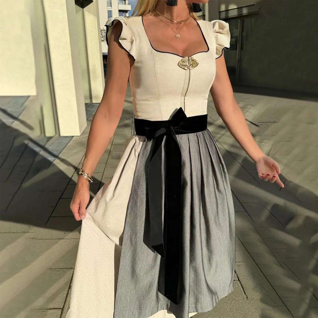 Elegantes weißes Dirndl für Damen, ideal fürs Oktoberfest, mit modernem Design und komfortabler Passform.