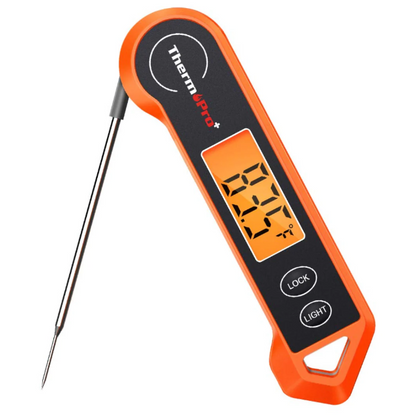 Elektronisches Küchenthermometer mit beleuchtetem Display und klappbarer Sonde für präzise Temperaturmessung.