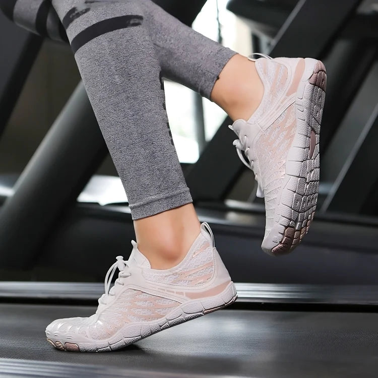 "Ergonomische FloraX Pro Barfußschuhe aus atmungsaktivem Material mit rutschfester, flexibler Sohle und wasserdichtem Design.