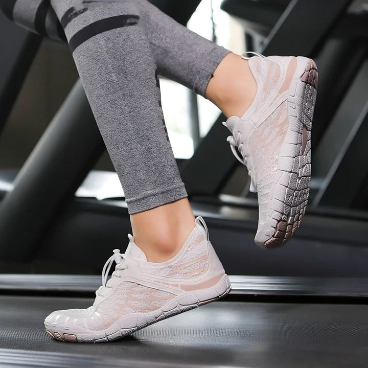 "Ergonomische FloraX Pro Barfußschuhe aus atmungsaktivem Material mit rutschfester, flexibler Sohle und wasserdichtem Design.