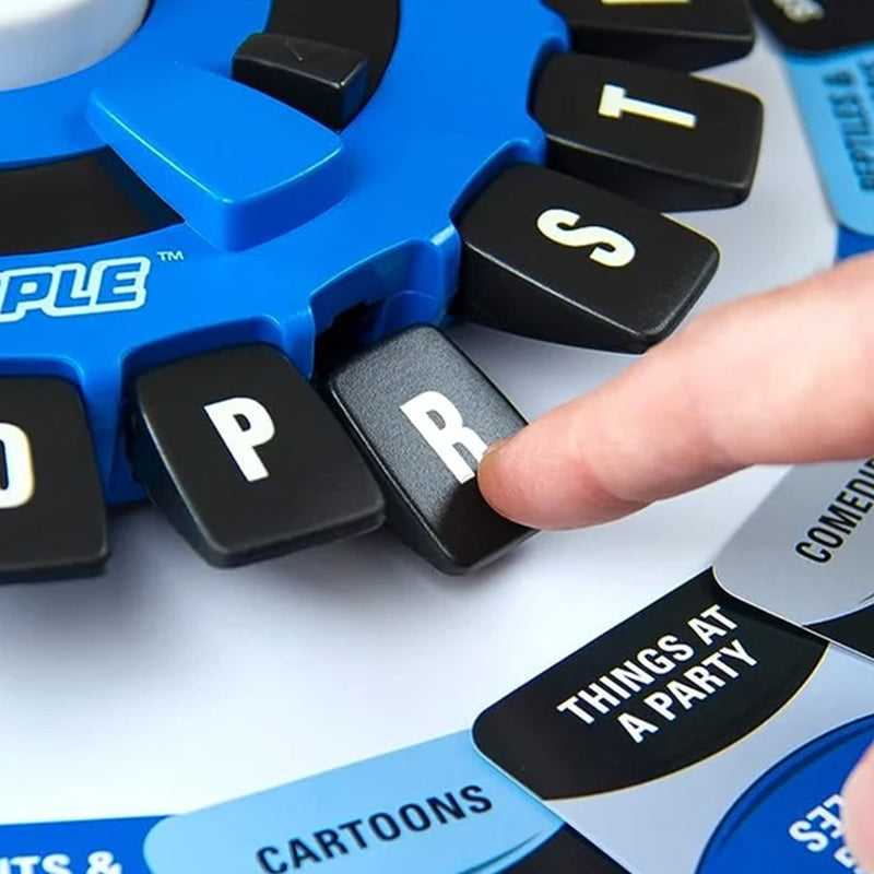 "Fröhliches Tapple Spieleset mit farbigem Kunststoffrad, perfekt für rasante Familienspiele und kreative Wortherausforderunge