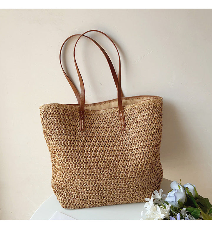 Geflochtene Korbtasche aus Rattan mit stilvollen Lederhenkeln, perfekt für den Sommer, Frauen-Tasche, elegant und geräumig.