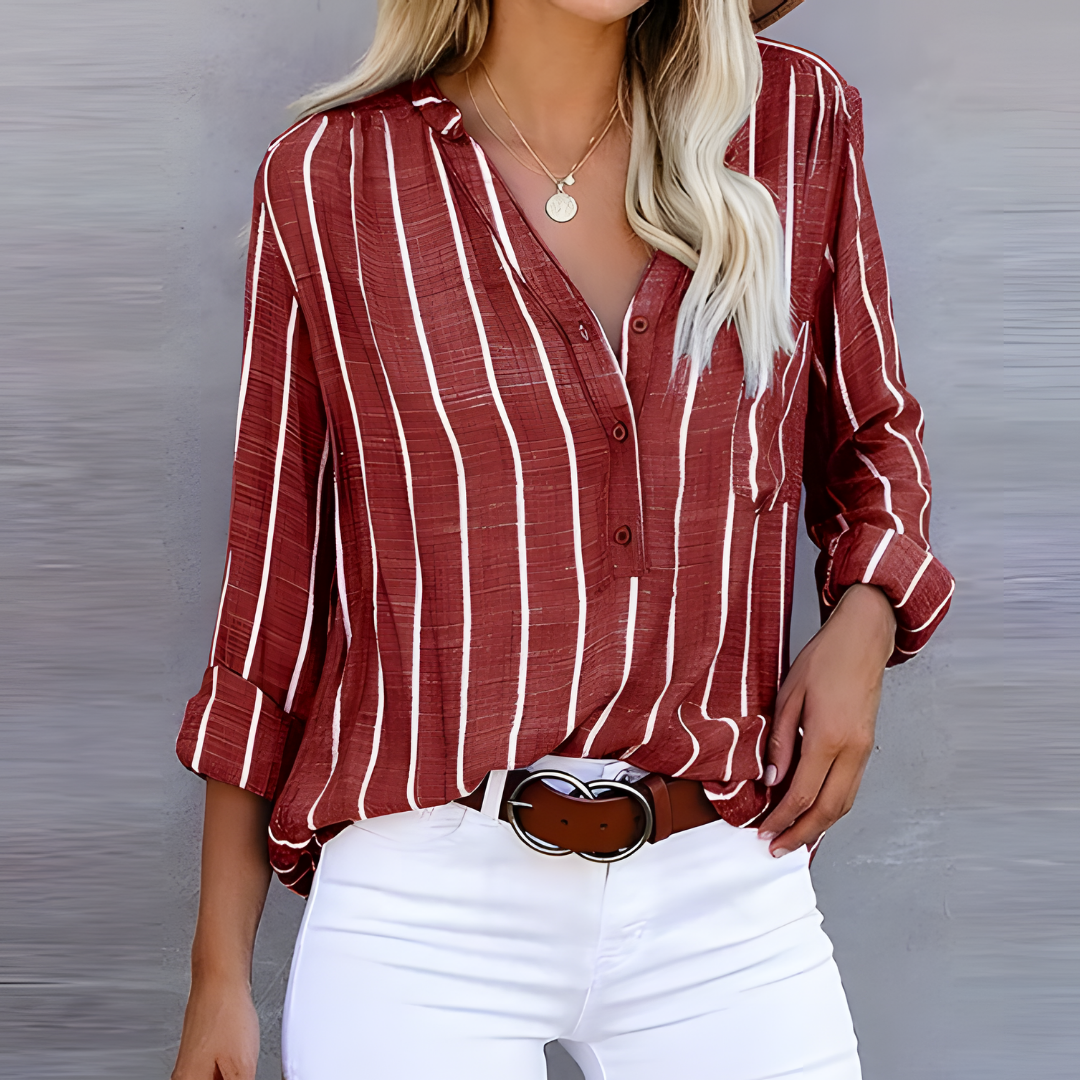 Gestreifte Damenbluse mit Knopfleiste, lange Ärmel, elegantes Design, stilvolle Streifen, perfekt für Büro und Freizeit.