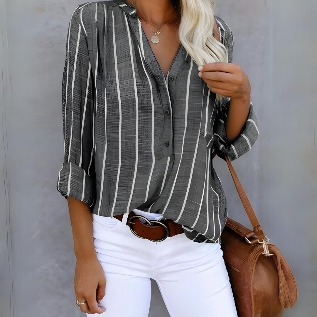 Gestreifte Damenbluse mit Knopfleiste, lange Ärmel, elegantes Design, stilvolle Streifen, perfekt für Büro und Freizeit.