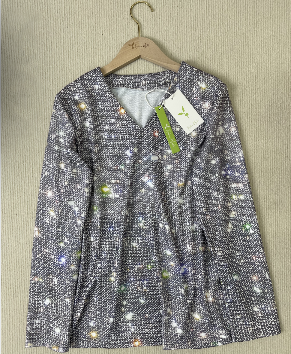 "Glitzernde Damen Langarmbluse mit funkelndem Design, elegant und stilvoll für glamouröse Anlässe, in klassischem Schnitt."