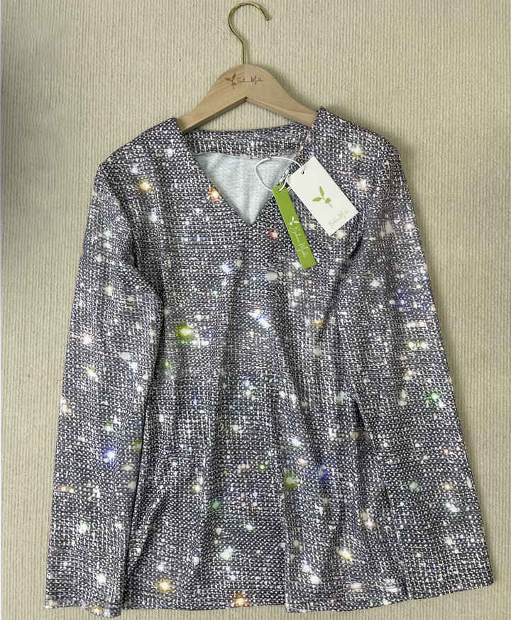 "Glitzernde Damen Langarmbluse mit funkelndem Design, elegant und stilvoll für glamouröse Anlässe, in klassischem Schnitt."