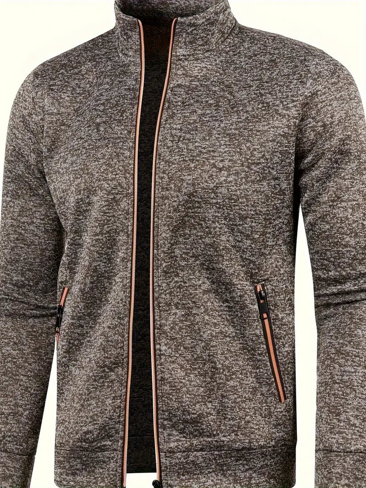 "Graue Herrenweste mit Reißverschluss vorne für Herbst und Winter, stilvoll und funktional."