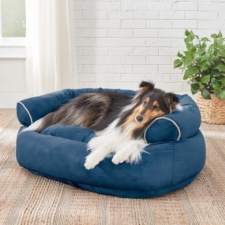 "Graues orthopädisches Hundebett, beruhigendes Design, natürliche Materialien, für maximalen Komfort und Stressabbau."