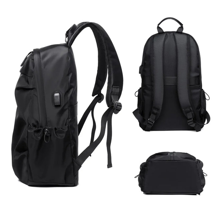 "Herren Anti-Diebstahl Rucksack, wasserdicht, USB-Anschluss, schwarz-grau, ergonomisches Design, ideal für Reisen."