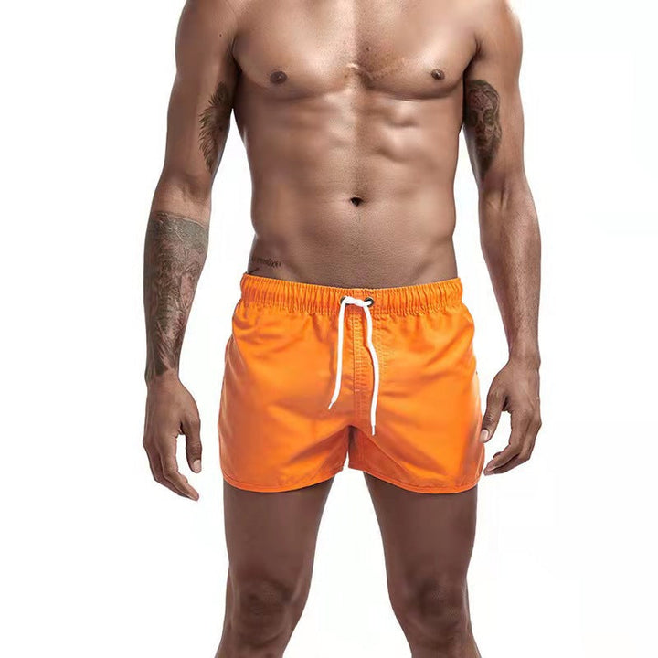 "Herren Badehose, schnell trocknend, modern und komfortabel, mit elastischem Bund und Taschen, ideal für Strandtage."