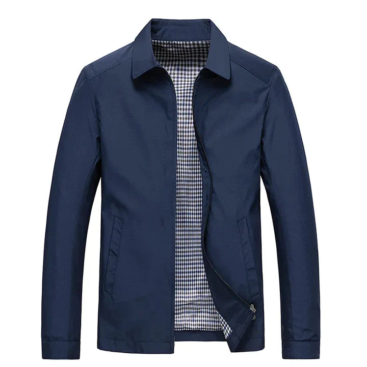 "Herren Frühjahrsjacke in Blau, wasserabweisend mit modernem Stehkragen, für Business und Casual Looks geeignet."