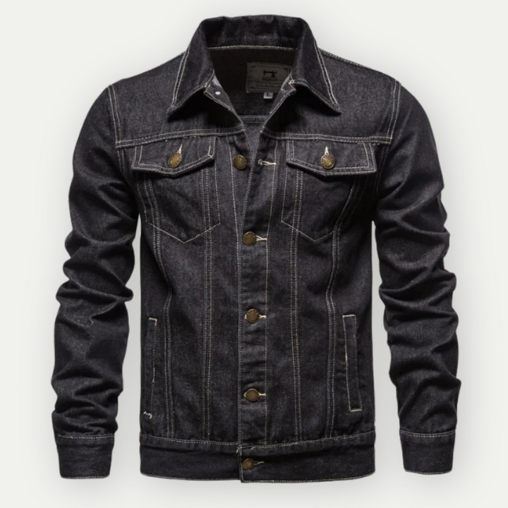 "Herren Jeans-Trucker-Jacke in robustem Denim, klassischer Schnitt, Detailansicht mit verstellbaren Manschetten und Taille."