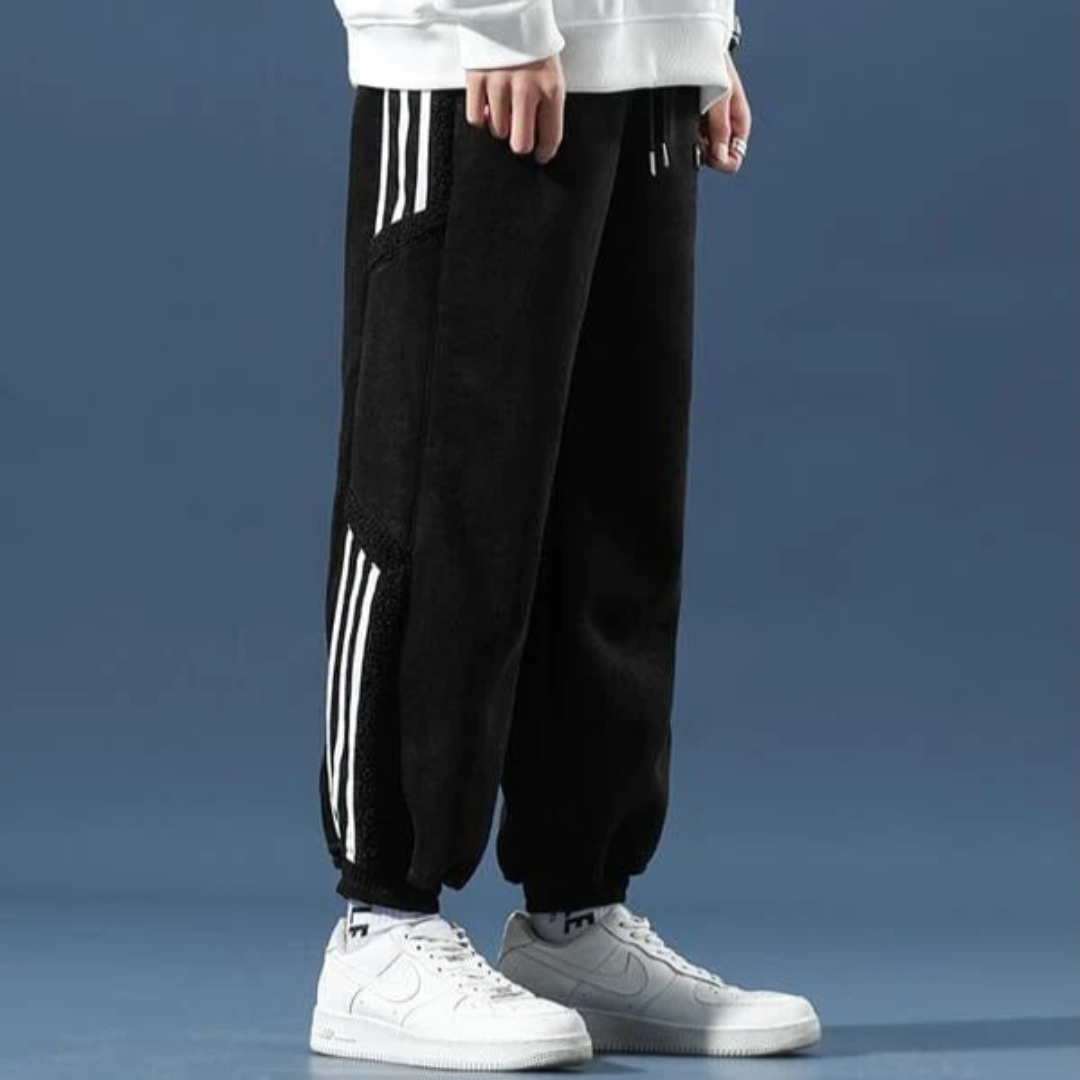 "Herren Jogger Hose in Grau, lässig und bequem, elastischer Bund, ideal für Sport und Freizeit im sportlichen Stil."