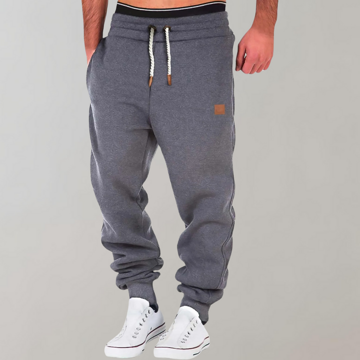 "Herren Jogginghose, bequem & stilvoll, schlankes Design in Grau mit elastischem Bund und Seitentaschen für Herren"